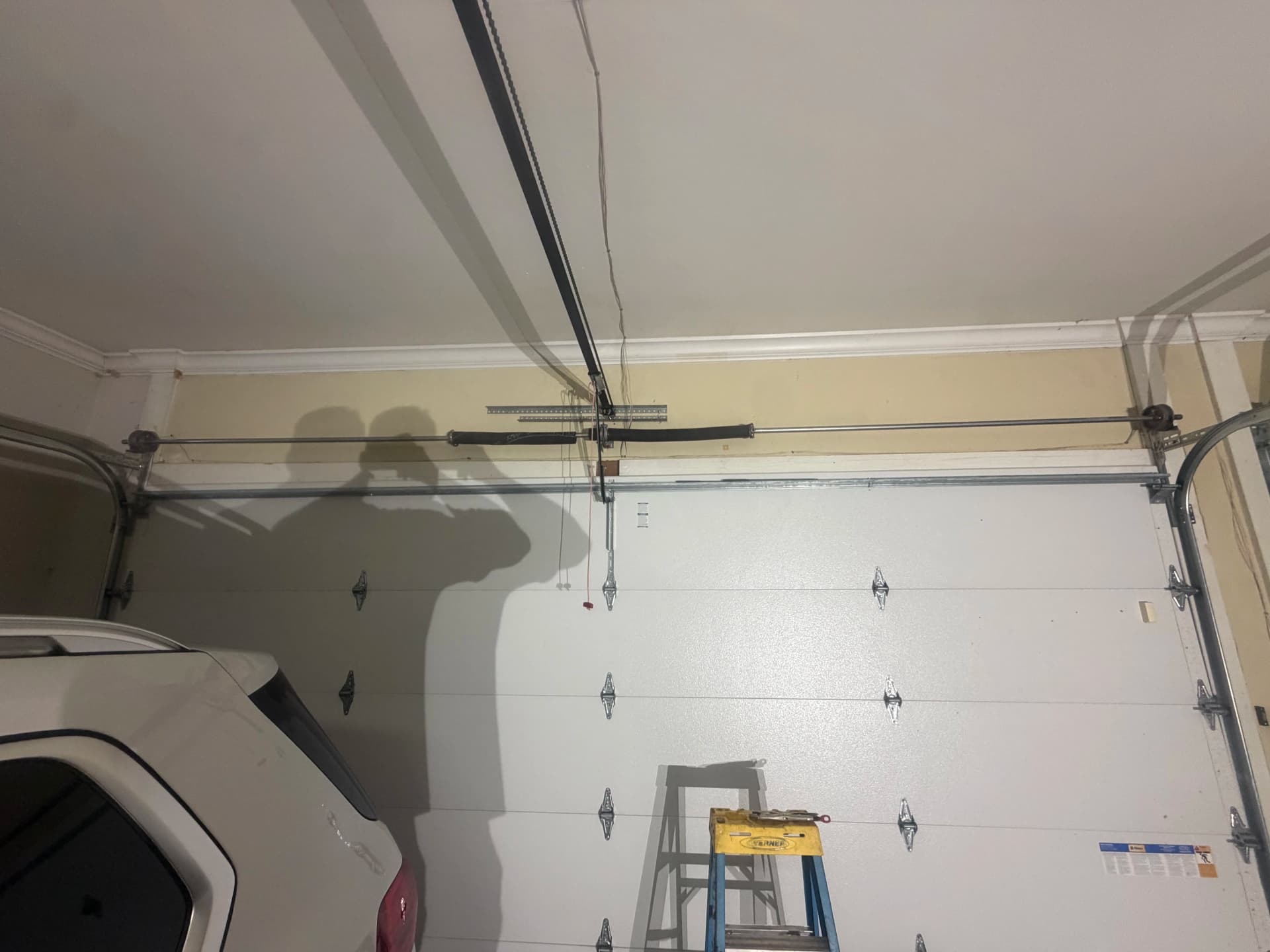 Gallery photos for Broken Torsion Spring Repair That Gets Your Door Moving Again: Image #1