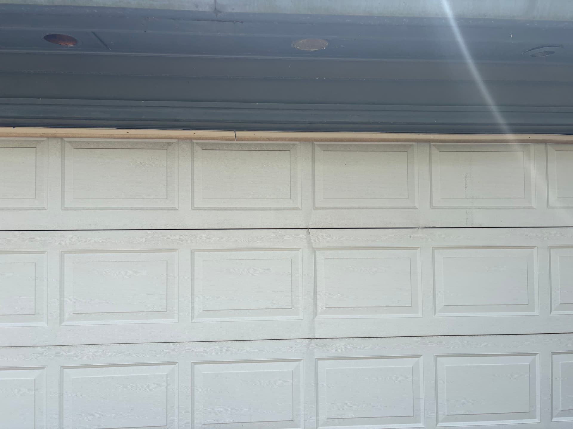 Cracked Garage Door Panels That Need Attention