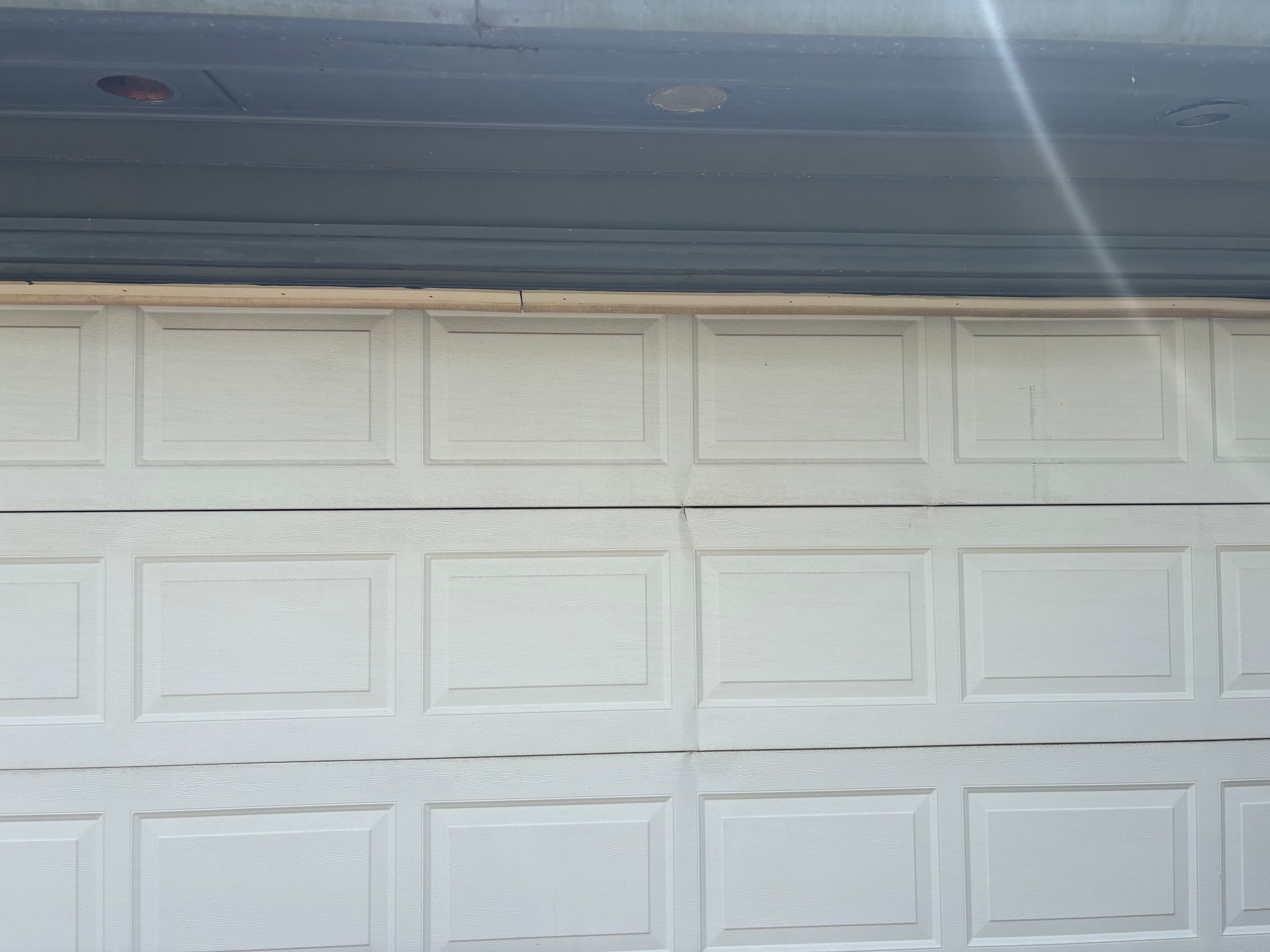 Project Cracked Garage Door Panels That Need Attention image
