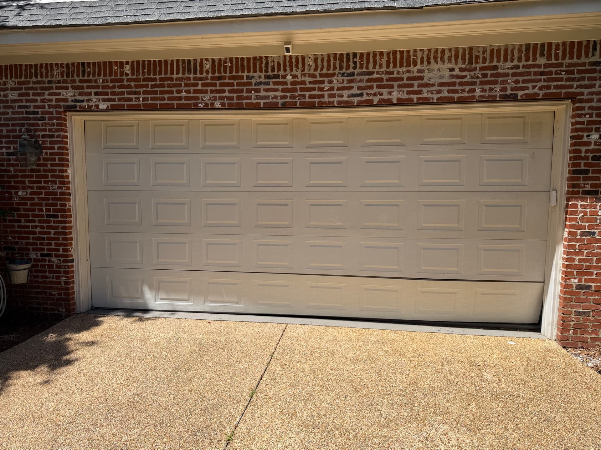 What a Damaged Garage Door Panel Actually Does to Your System