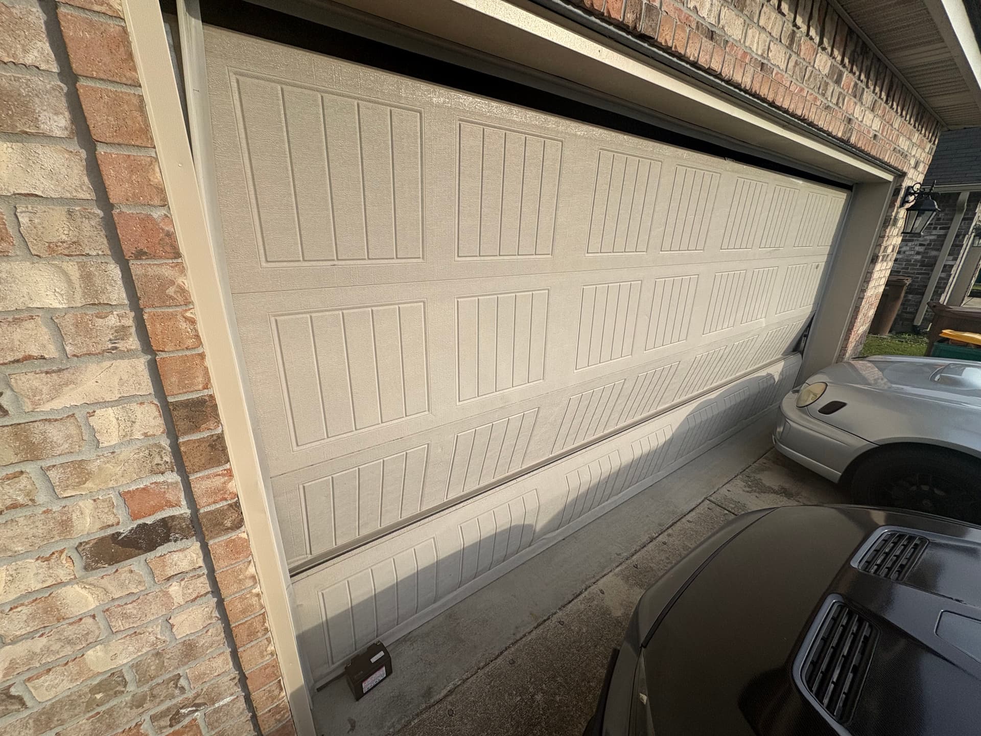 Gallery photos for Garage Door Off Track and Not Closing Right? Here's What to Do: Image #2