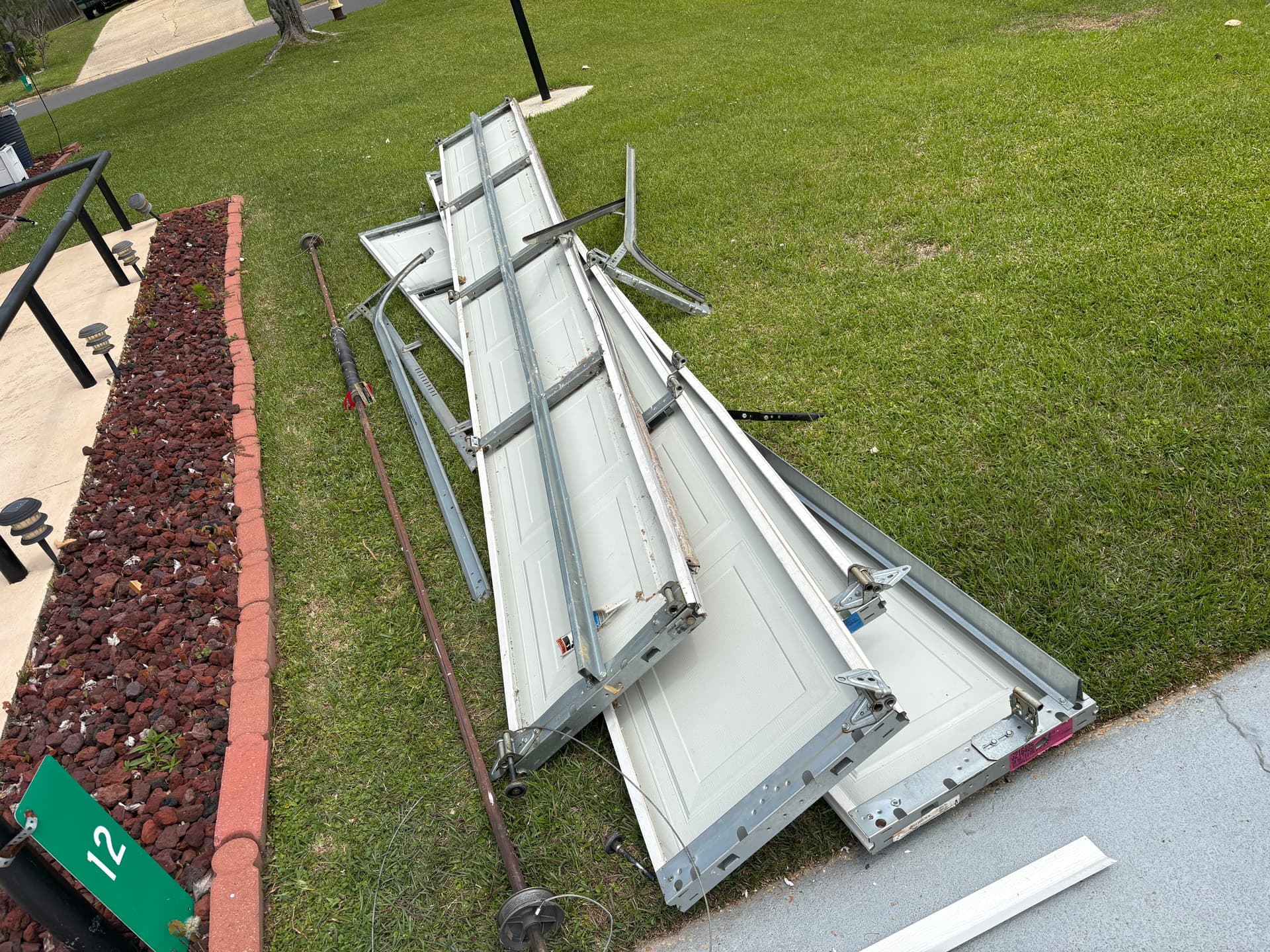 Gallery photos for Broken Garage Door Removal Done Right Before New Installation: Image #1