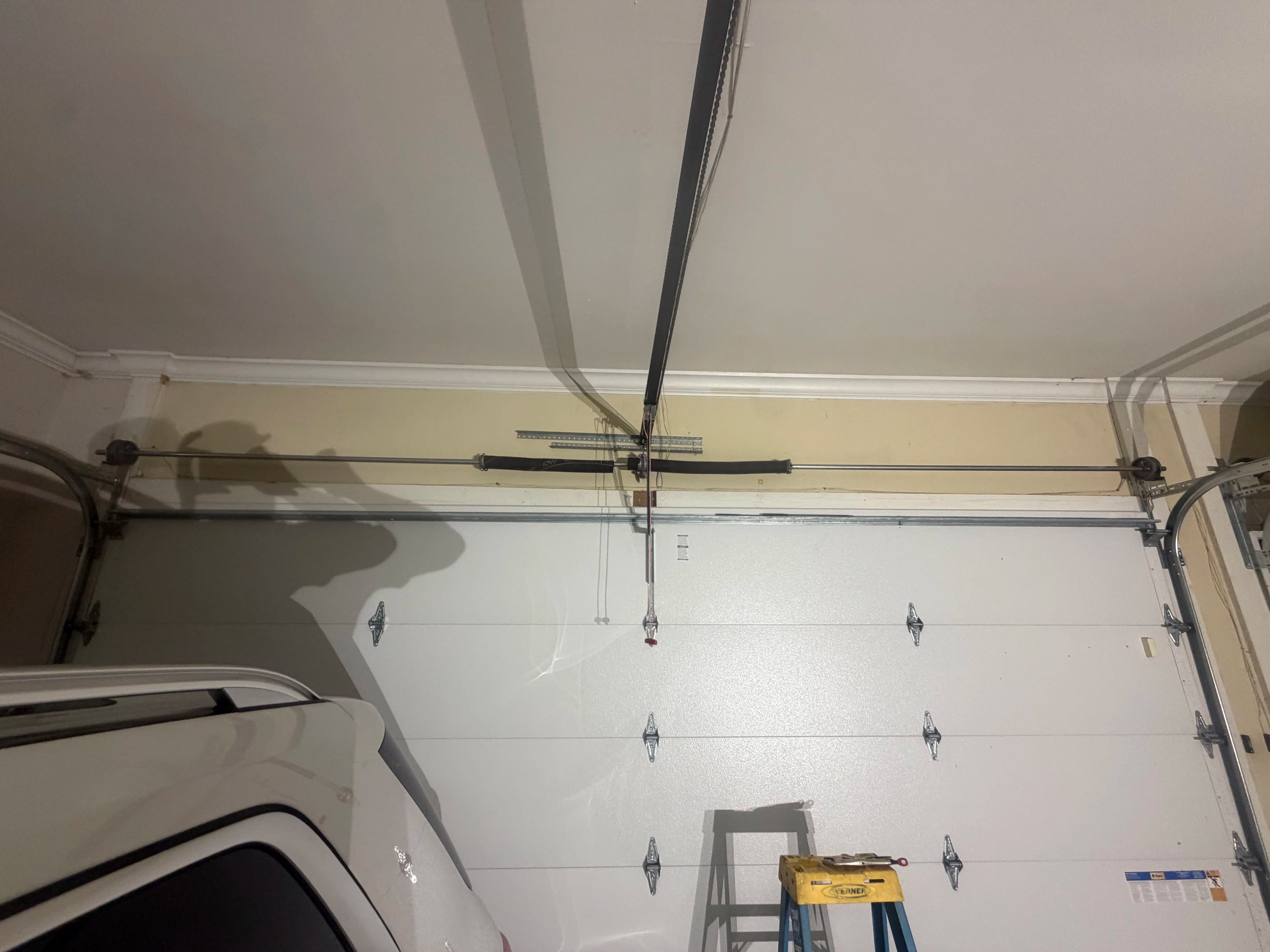 Project Broken Torsion Spring Repair That Gets Your Door Moving Again image