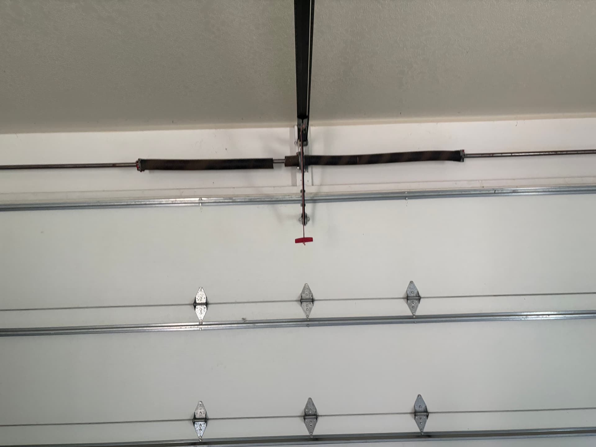 Gallery photos for Broken Garage Door Spring? Here's What You Need to Know: Image #1