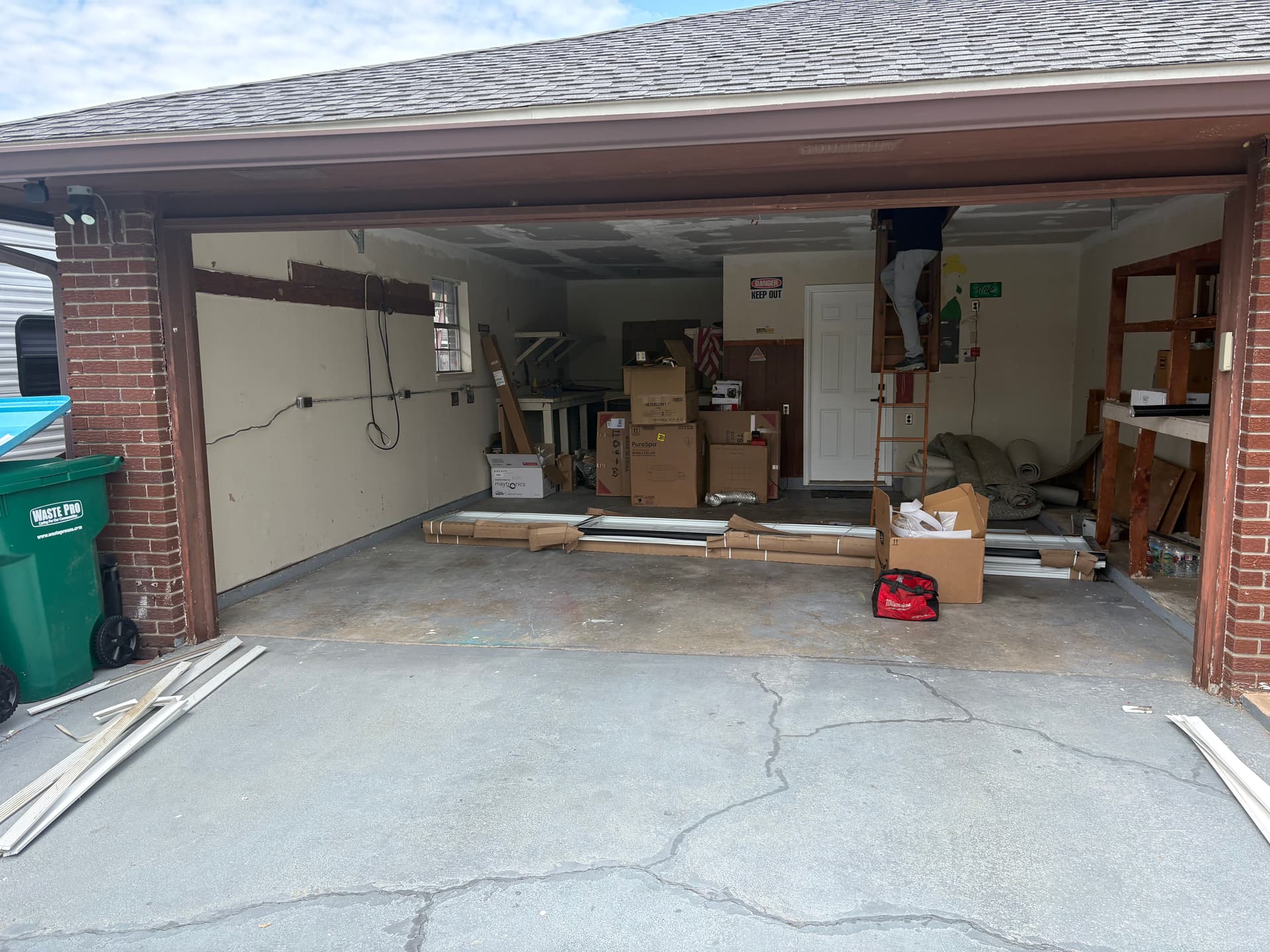 Broken Garage Door Removal Done Right Before New Installation