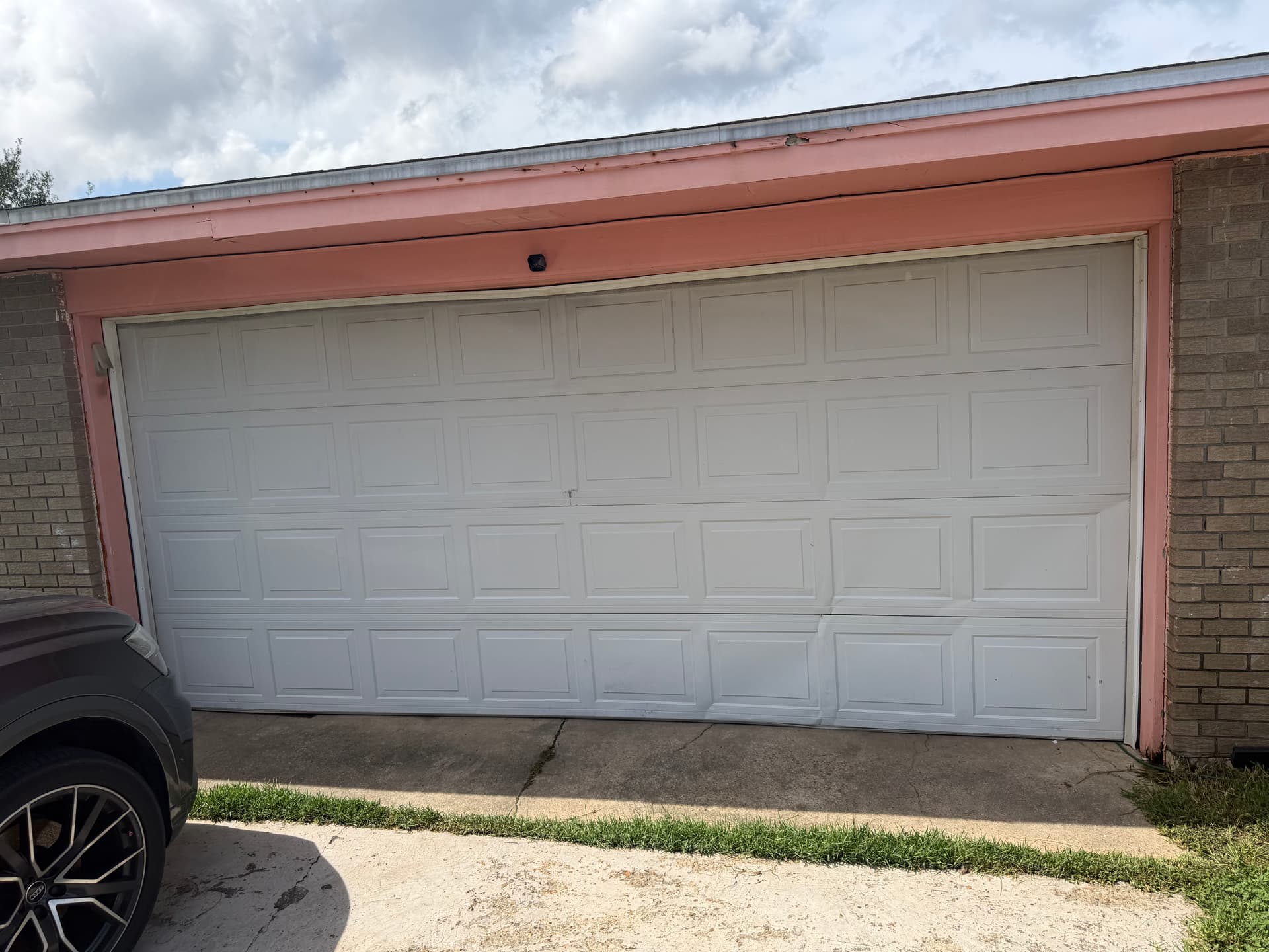What a Damaged Garage Door Actually Costs You image