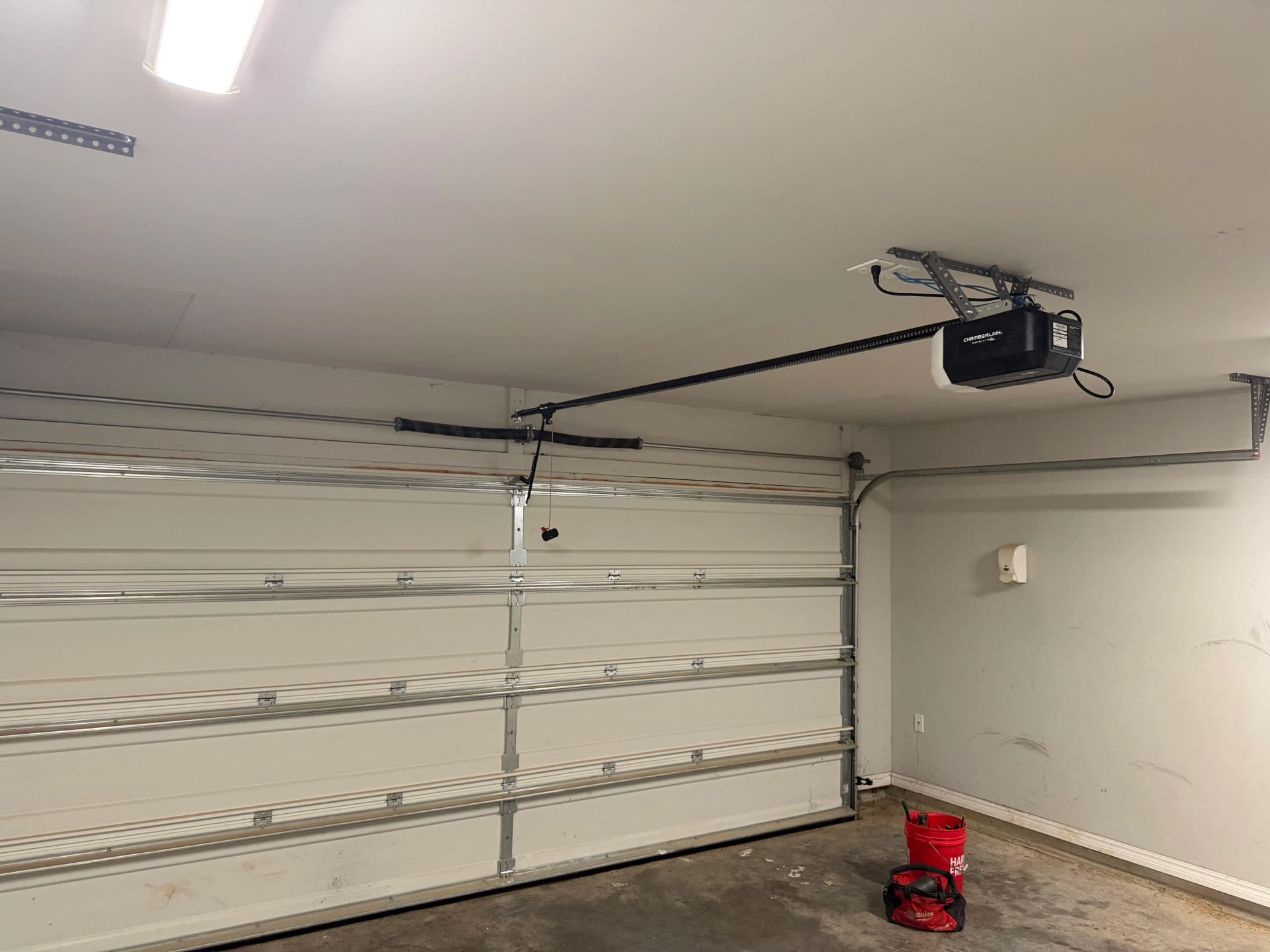 Dual Spring Installation Keeps This Garage Door Lifting Right image